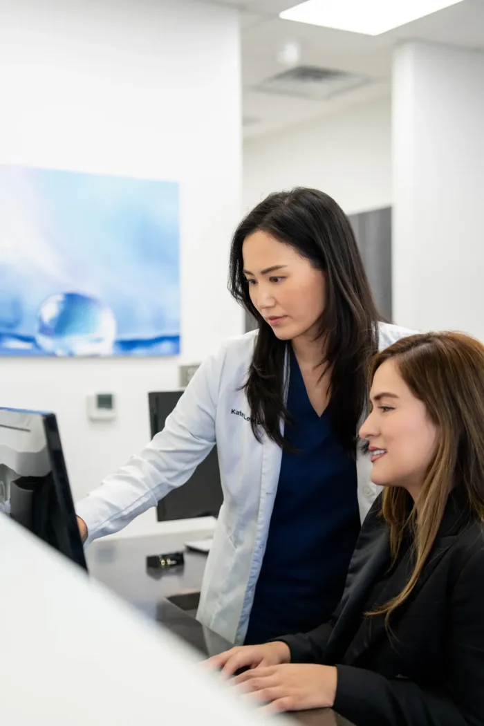 Orthodontist reviewing a digital scan with a patient